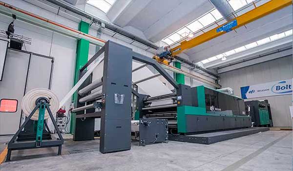 Figure 1: The new, 1.8-meter (71-inch) wide Reggiani BOLT printer at ITMA is designed to give textile manufacturers high uptime and reliability.