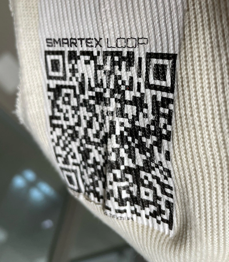 smartex loop passport attached to a fabric roll