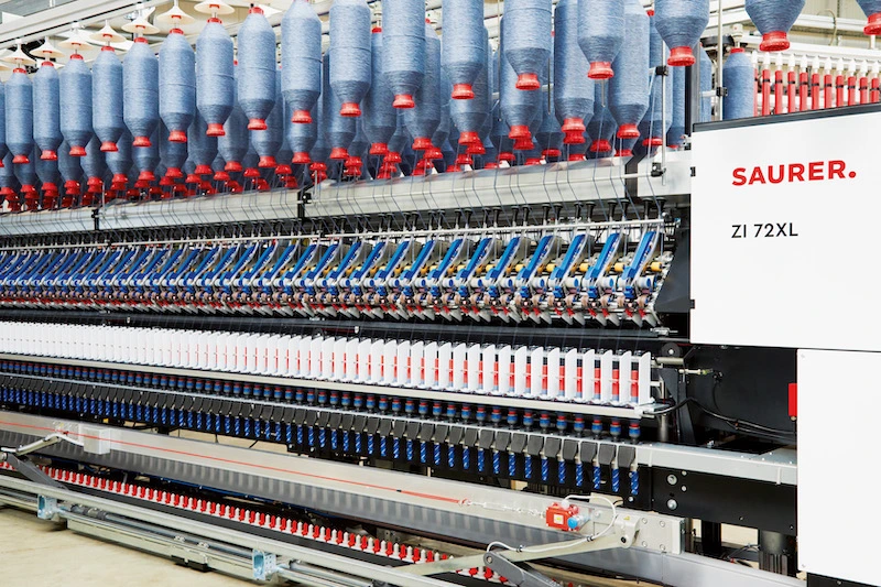 zi 72xl compact-spinning machine processes recycled yarn.