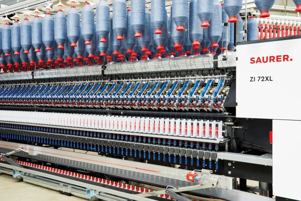 ZI 72XL compact-spinning machineprocesses recycled yarn.