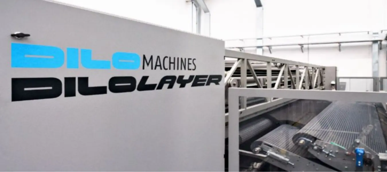 Industrial textile machinery installed at ALMA SPA for advanced needling and floor covering production