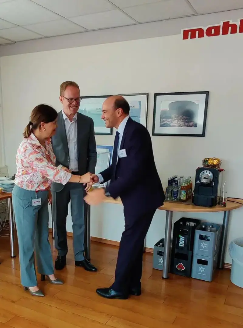 Mahlo factory building with engineers working on textile measurement machines and innovation in Germany
