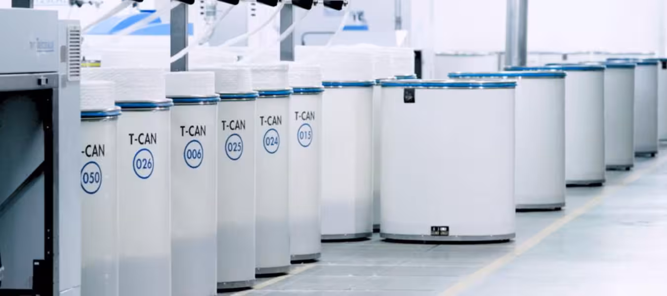 T-CAN automated guided vehicles transporting sliver cans in a spinning mill