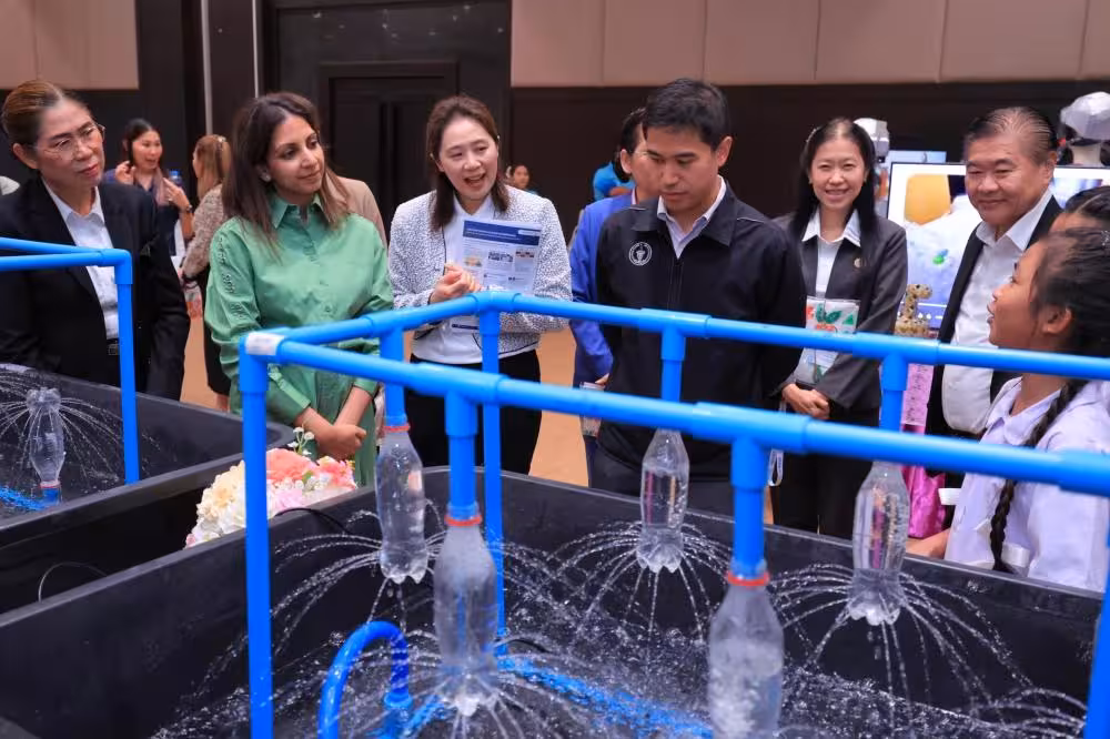 Students and teachers collecting plastic bottles for recycling at a Bangkok school under Indorama Ventures’ PET recycling project.