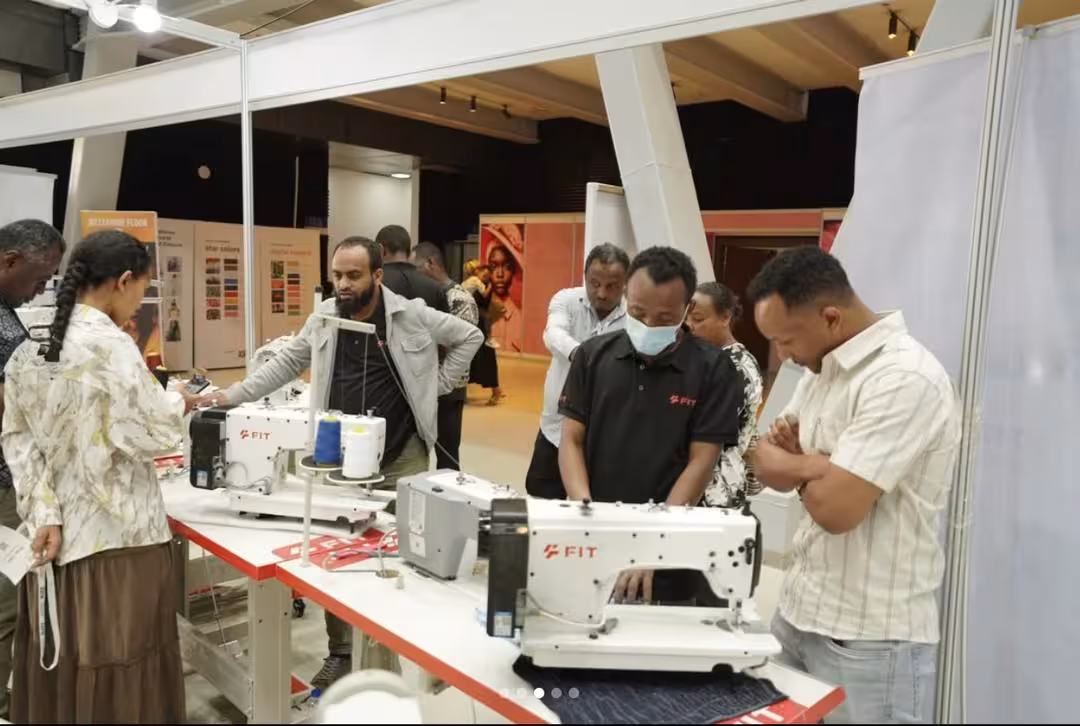 Africa Sourcing and Fashion Week 2025 exhibition hall with textile and fashion booths in Addis Ababa