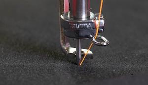 Groz-Beckert embroidery needle on industrial fabric