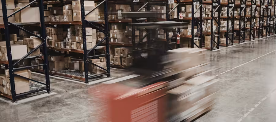 Warehouse forklift in motion