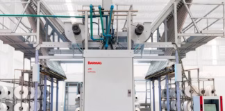 Auto-Doff System For Texturing Machines Auto Doff System integrated into Barmag eFK texturing machines