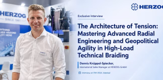 Dennis Knüppel-Spiecker, International Sales Manager at HERZOG GmbH, during an exclusive ITM 2026 Istanbul interview discussing advanced radial engineering, high-load technical braiding, and global textile machinery innovation.