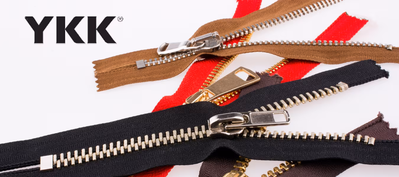 YKK metal zippers and fastening solutions for apparel manufacturing, fashion accessories, textile production, and garment industry applications