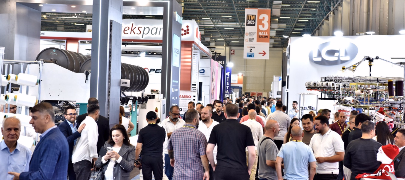 Visitors explore textile machinery and automation technologies during ITM 2026 in Istanbul.