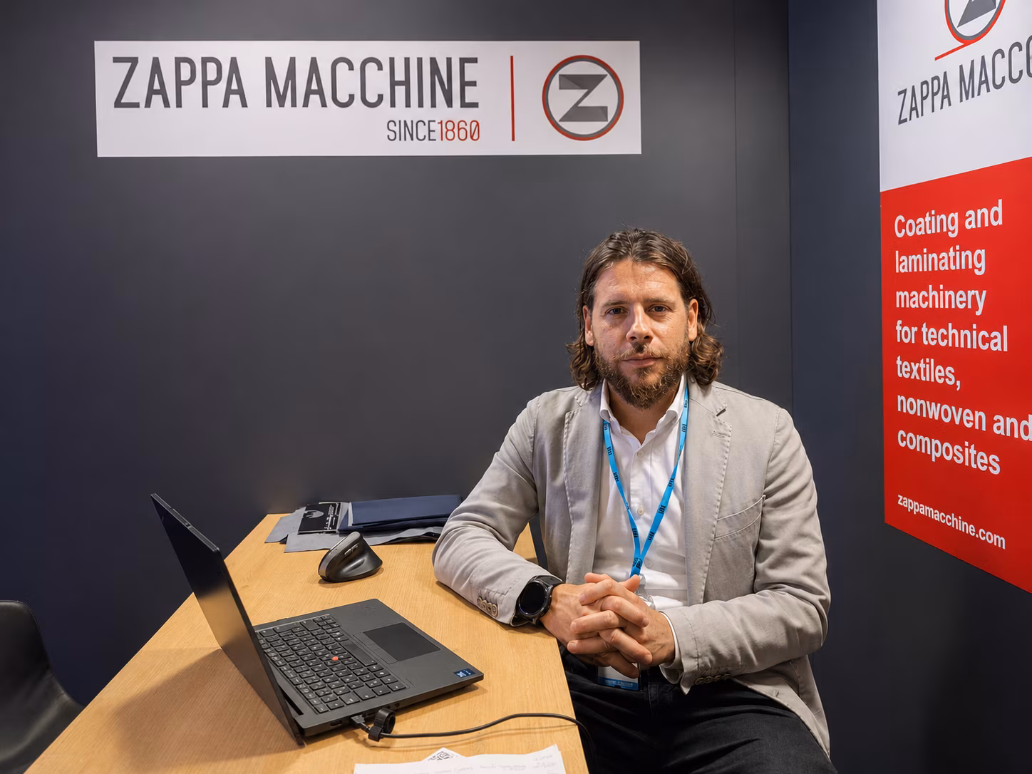 Francesco Boris of ZAPPA MACCHINE discussing flexible coating and solvent-free lamination technologies during an interview at ITM 2026 in Istanbul.