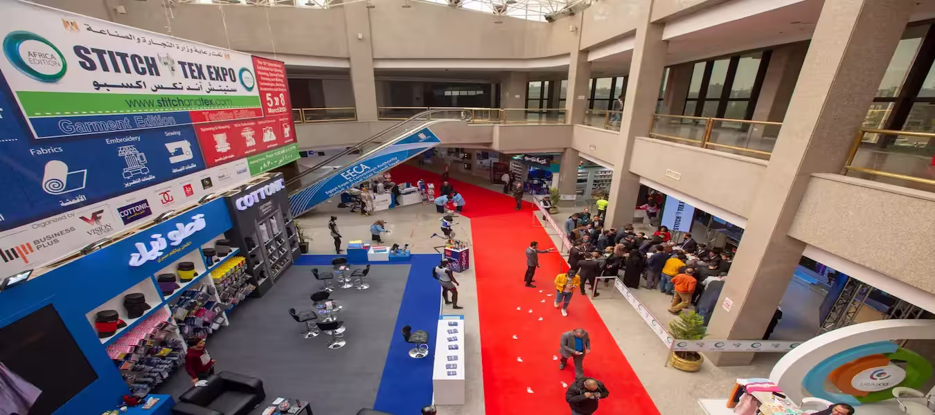 Business networking and textile machinery exhibitors at a Morocco textile exhibition